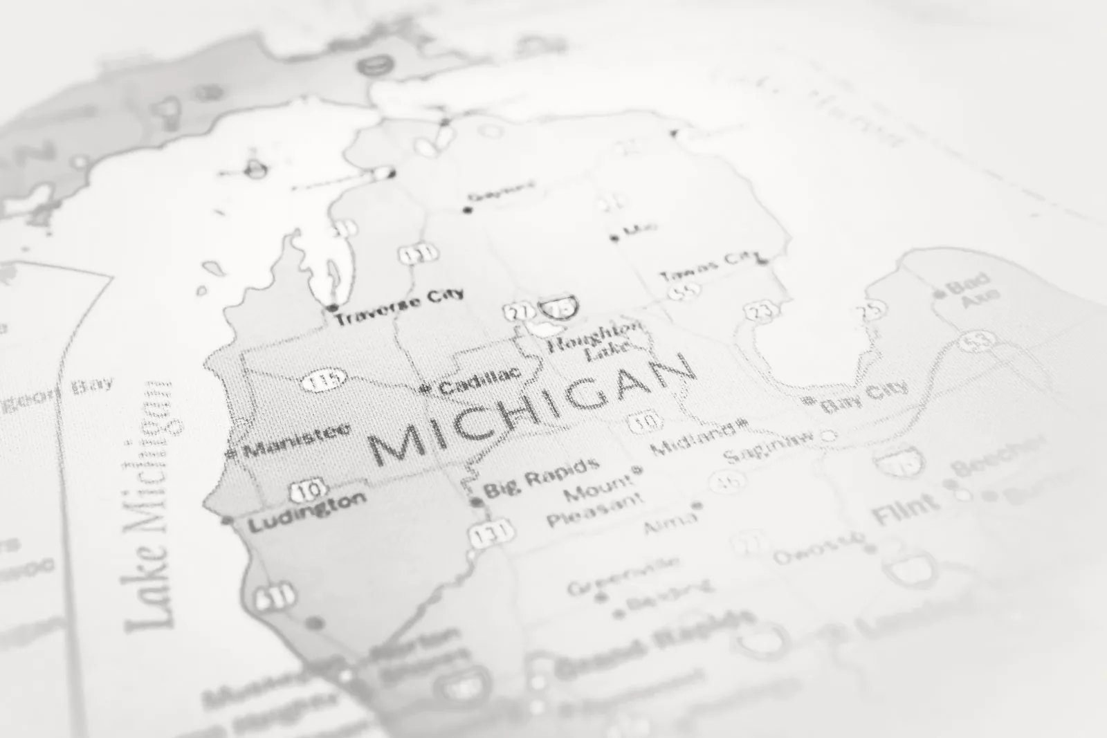 A clear map view of Michigan, with the Great Lakes prominently highlighted, showcasing their vast expanse, the state's geographical context, and the importance of these freshwater bodies to the region.
